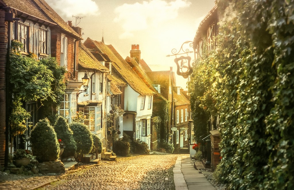 A colour photo of a pretty cobbled street